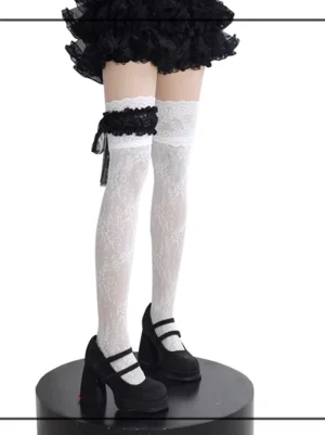White floral lace over-the-knee stockings with black bow garter and ruffled top cuff, Jirai Kei aesthetic full leg front view