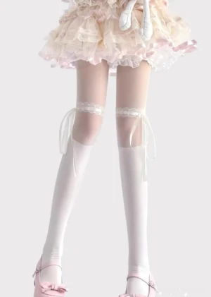 White lace thigh-high Jirai Kei socks left side three-quarter view detachable ribbon bows sheer silk texture