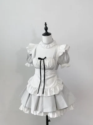 White Jirai Kei maid dress with detachable apron flat lay showing full silhouette ruffled trim design aesthetic