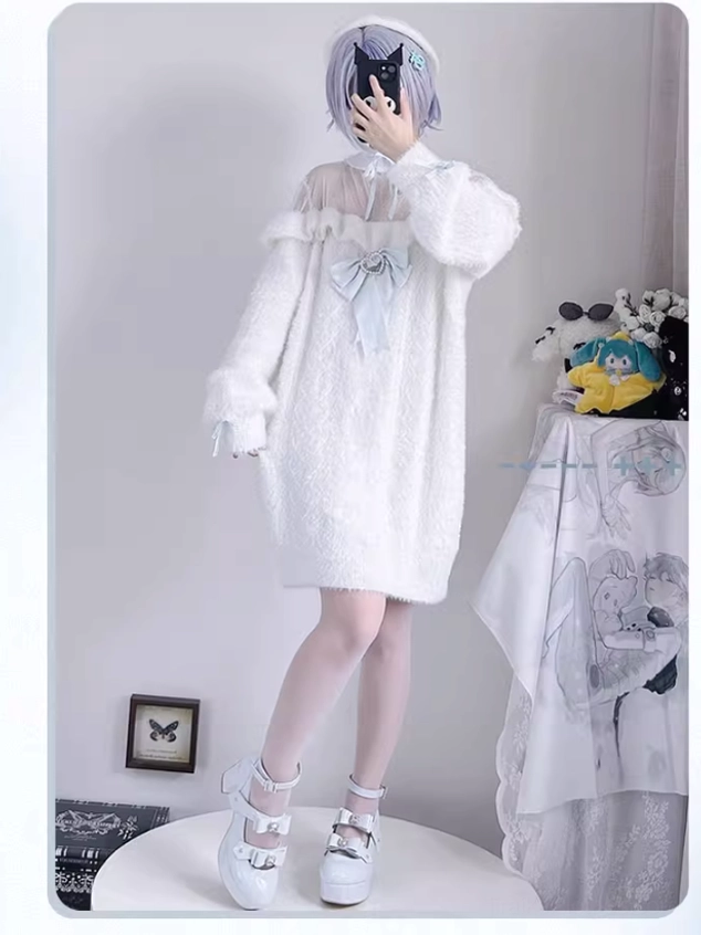 Cosplayer wearing white fuzzy off-shoulder sweater dress styled with white platform shoes and white stockings, full-body front standing pose