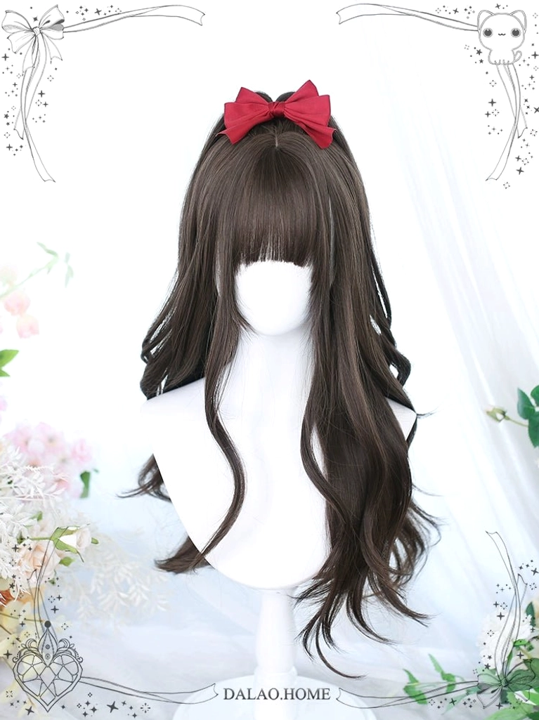 Long curly dark brown Jirai Kei wig with red bow on crown and straight bangs displayed on neutral fabric backdrop