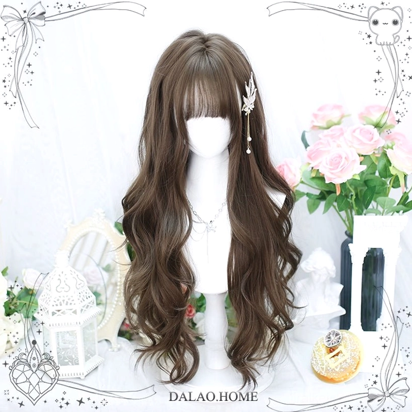 Long wavy light brown Jirai Kei wig with silver hair pin and straight bangs displayed with mirror and dessert styling elements