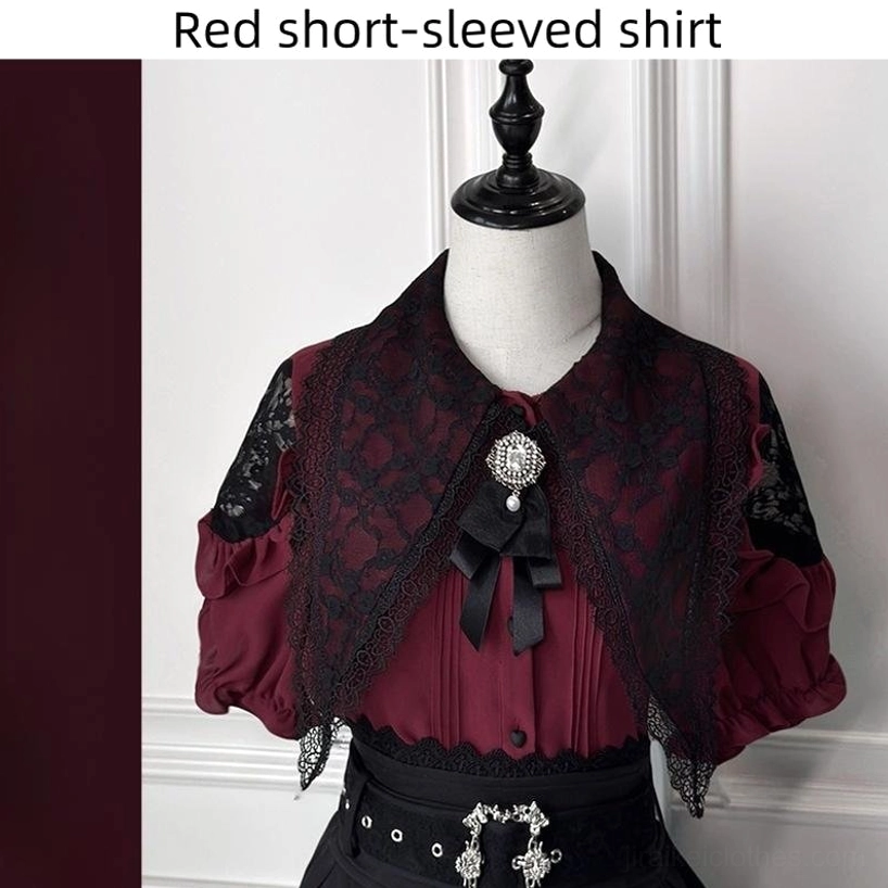 Wine red Jirai Kei blouse with black lace capelet and decorative belt buckle mannequin display dark sweet aesthetic