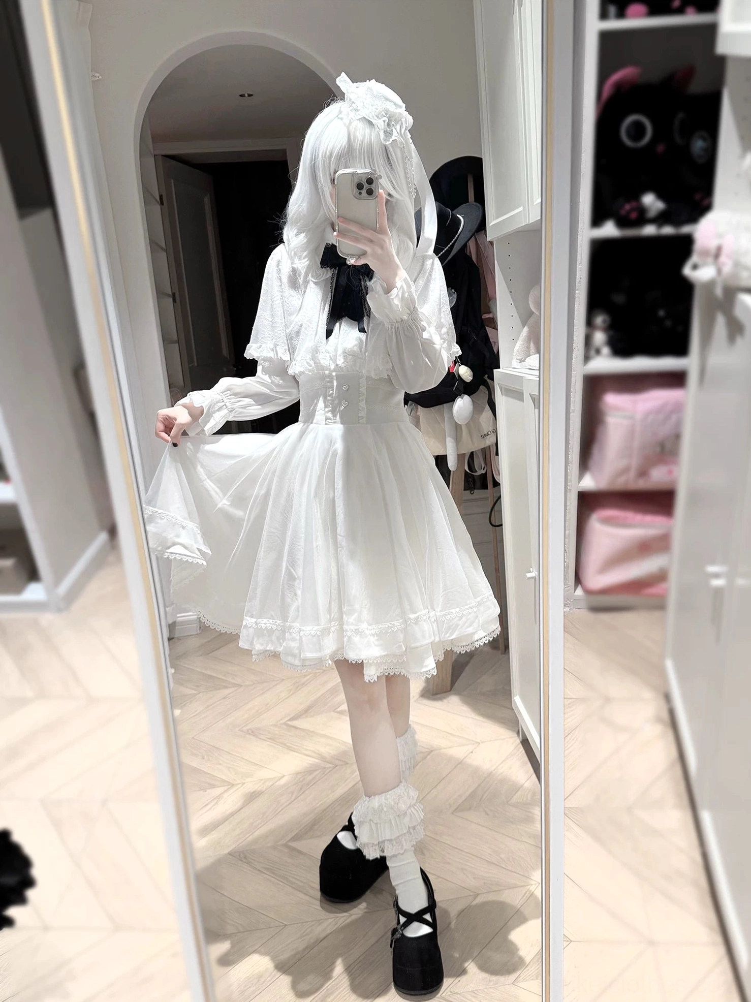 Jirai Kei winter cape construction details showing faux fur collar, lace insertions, hood design, and heart button fastenings