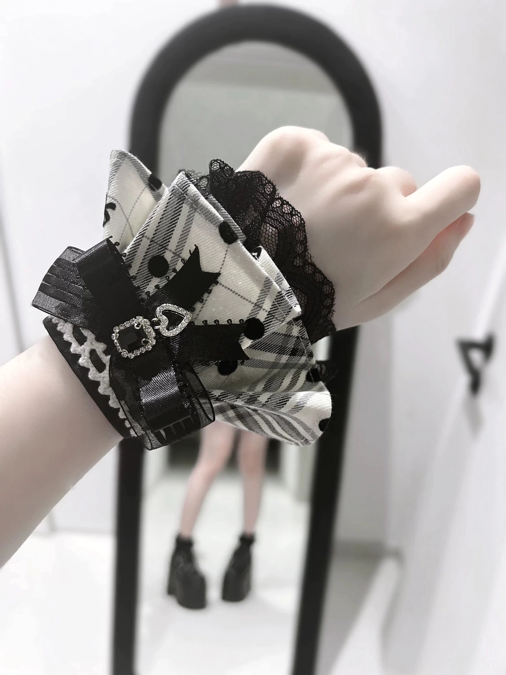Detailed display of pair of decorative wrist cuffs accessory showing one-size design and elegant finishing for Jirai Kei coordination