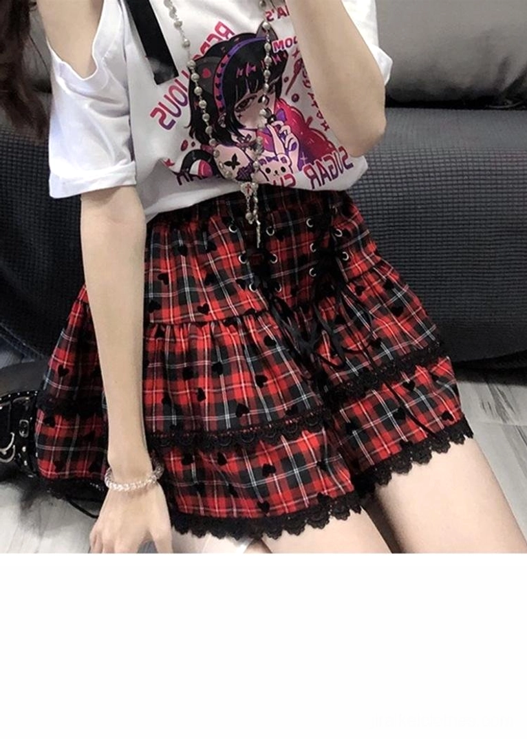 Y2K Jirai Kei complete two-piece outfit set featuring off-shoulder anime print tee with cold-shoulder design and matching black-white plaid ruffle mini skirt