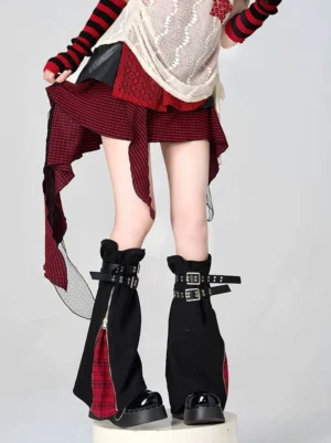 Jirai Kei Y2K leg warmer front full view featuring black base with red plaid grid patchwork design and dual adjustable buckle straps punk grunge aesthetic