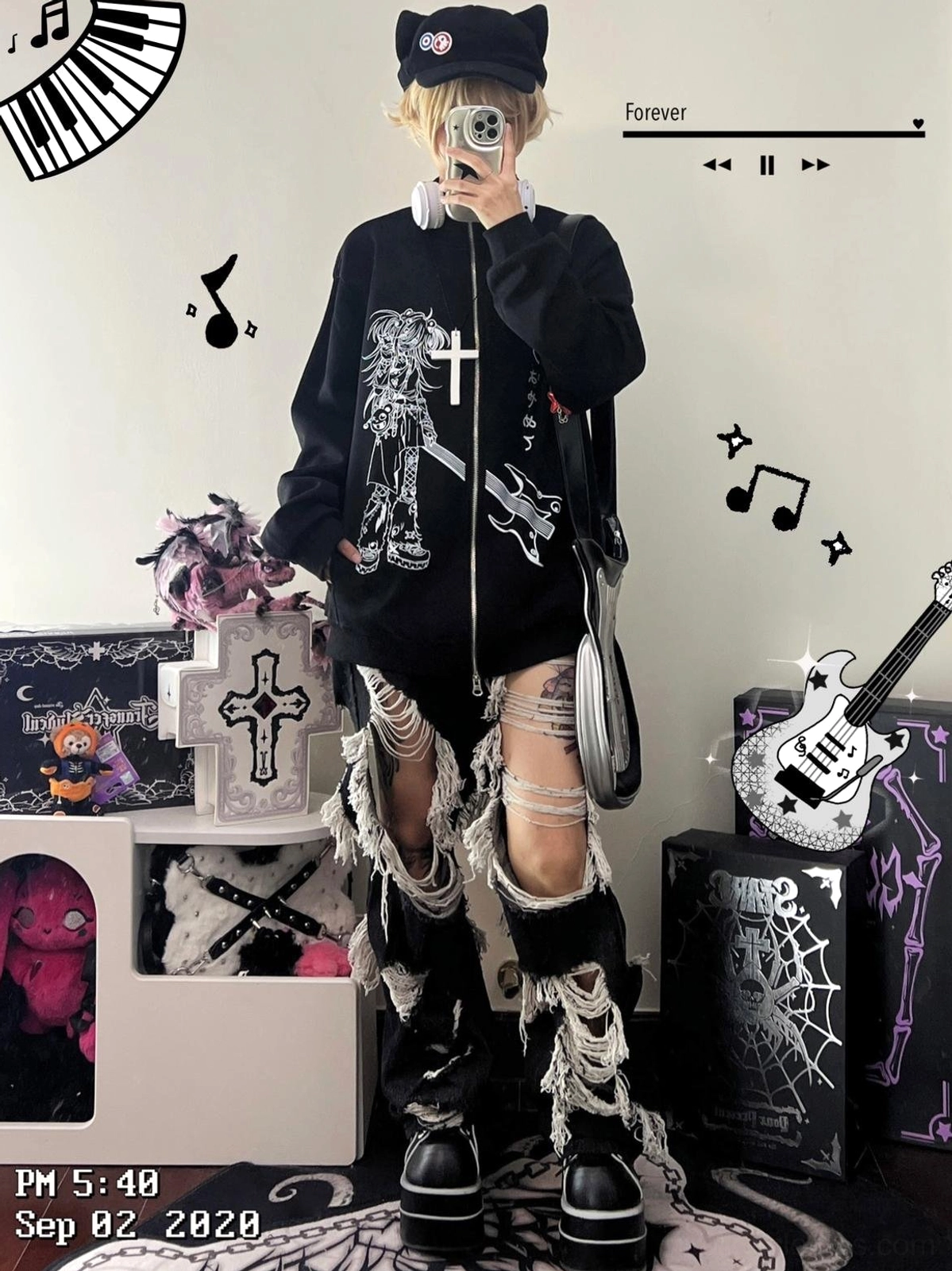 Male model wearing Jirai Kei zip-up hoodie with cross and guitar print variant mirror selfie shot ripped bandage pants peaked cap