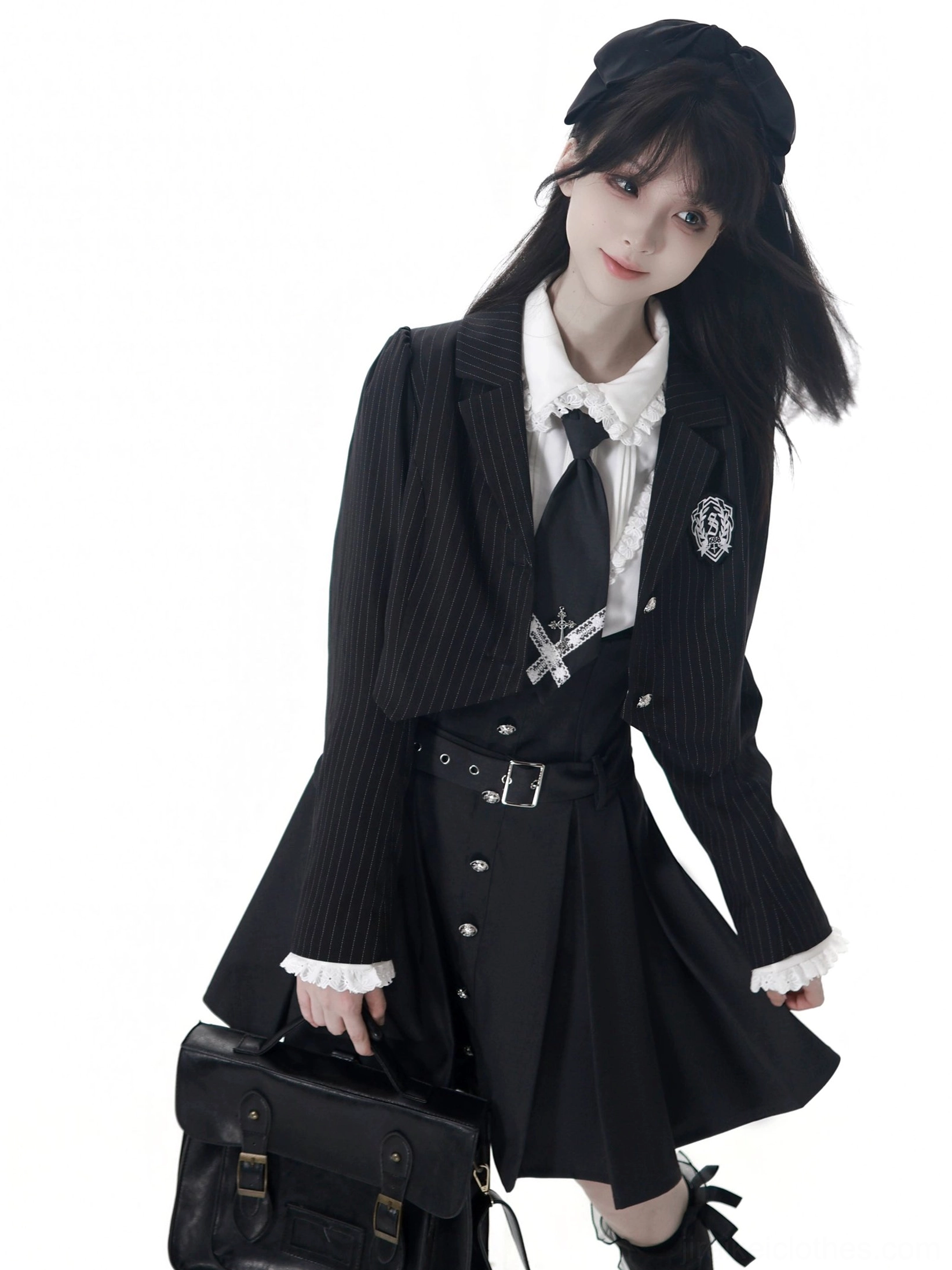 JK school uniform close-up detail showing metal campus badge, blazer lapel design, pinstripe pattern, and precision tailoring on cropped blazer front