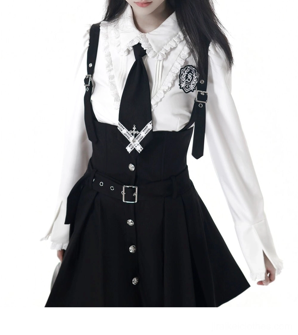 Dark academia JK uniform cropped blazer front view detail showing metal campus badge, lapel design, pinstripe pattern, and button details on fitted silhouette