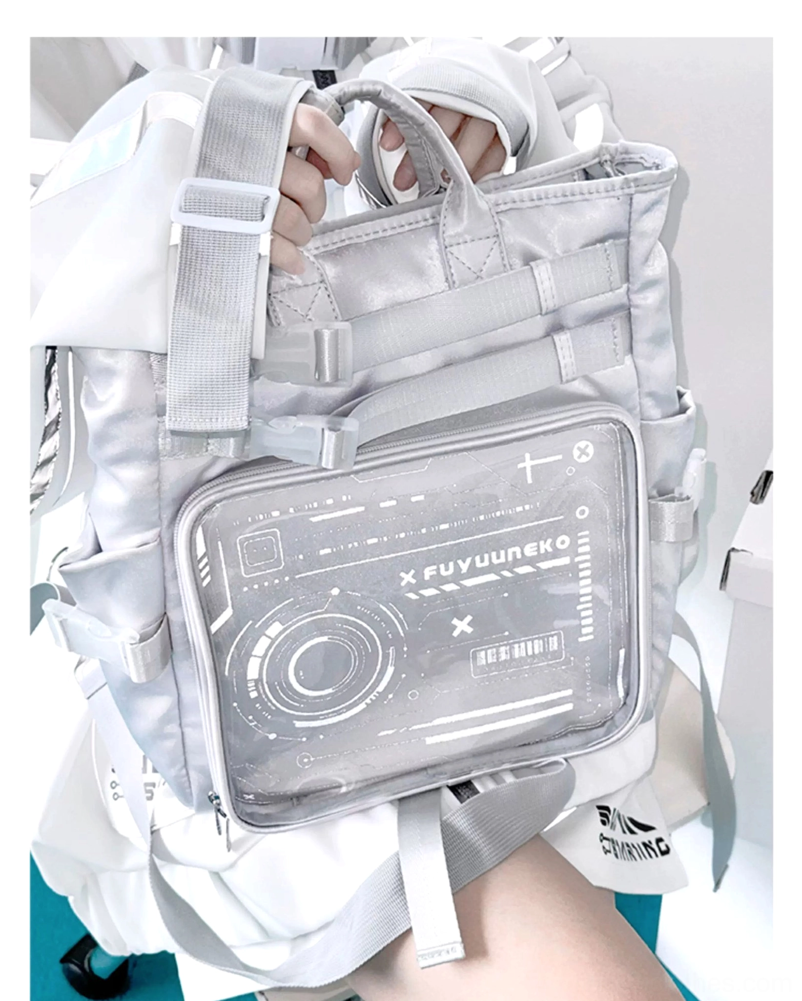 Large capacity Jirai Kei ita backpack worn on model showing real-world usage with anime character showcase display window active wear