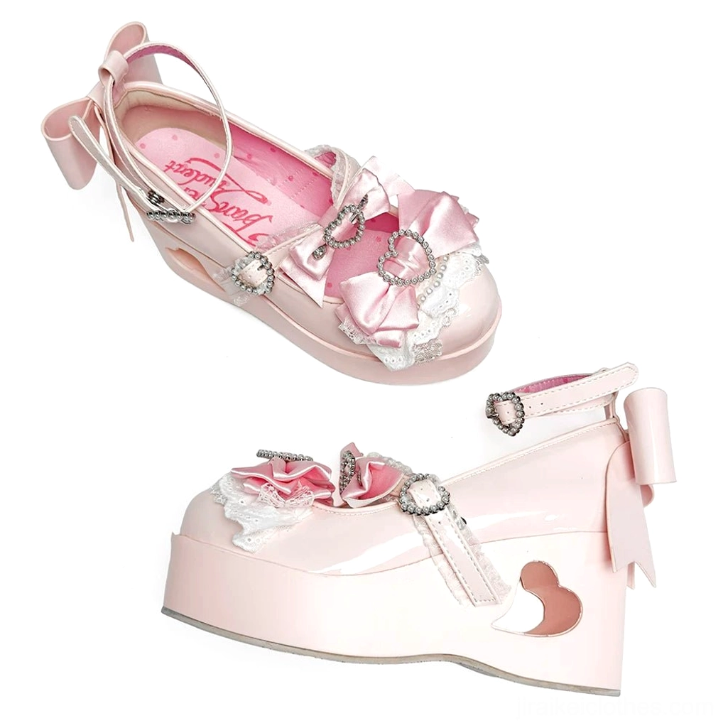 Light pink Jirai Kei platform Mary Jane shoe with satin bow with lace trim, rhinestone buckles, branded pink insole visible inside