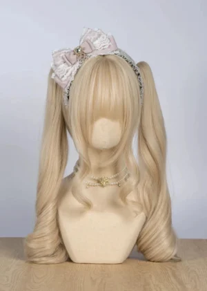Light pink ryousangata three-layered bow headband with heart-shaped rhinestone decoration front view, featuring delicate lace trim and dual-layer bow construction for Jirai Kei styling