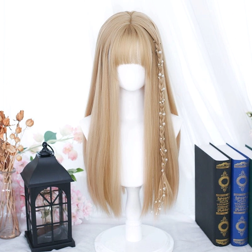 Long curly blonde Jirai Kei wig with straight bangs offering unique color option for subversive aesthetic