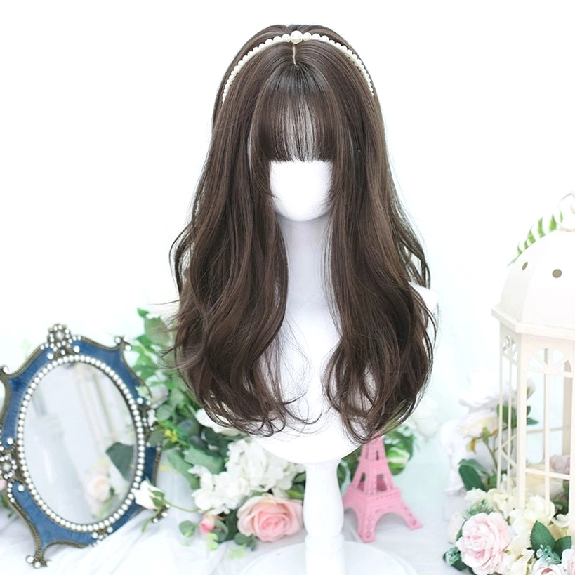 Long wavy multi-tone Jirai Kei wig with straight bangs showing color dimension and professional styling