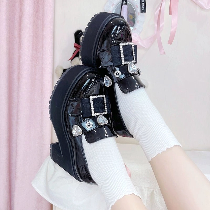 Matte black Jirai Kei platform loafers bottom sole view showing EVA construction and durability