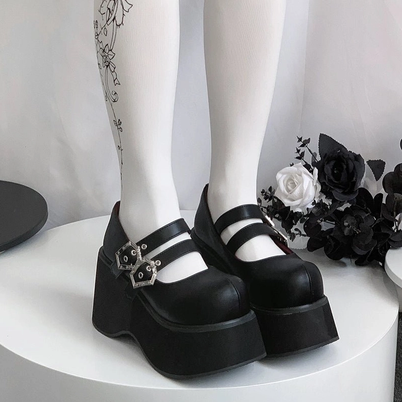Matte black Mary Jane platform shoes smooth leather finish dual silver buckles elevated thick platform sole front view