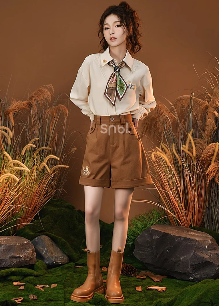 Mori kei beige embroidered blouse worn standalone showing delicate lace inserts and button-down styling versatility