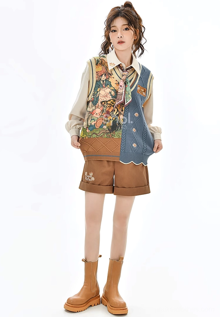 Full-body side view of vintage mori kei academy outfit set with asymmetrical knit vest, beige embroidered blouse, brown tailored shorts on white studio backdrop