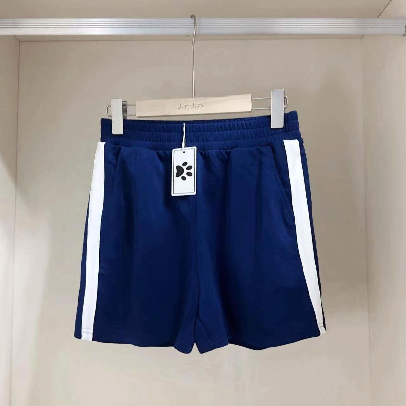 Navy Jirai Kei Jersey Maid matching shorts in elastic waist design, loose-fitting relaxed silhouette, paired with white stockings, flat lay and worn product display, seasonal summer option