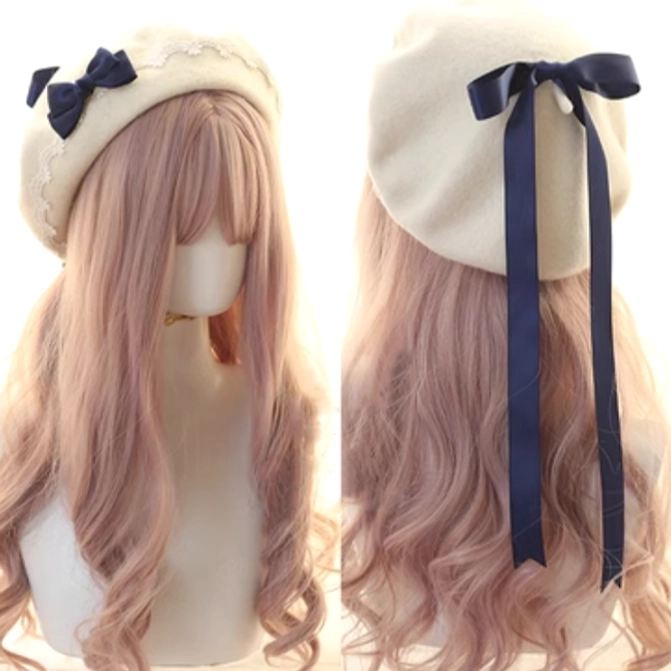 Off-white Jirai Kei beret with deep blue bow and flowing ribbon tail, mannequin styling showing elegant front and back silhouette