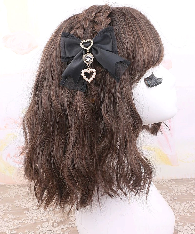 Pink bow hair clip with heart-shaped rhinestone and pearl chain accent - romantic J-fashion accessory