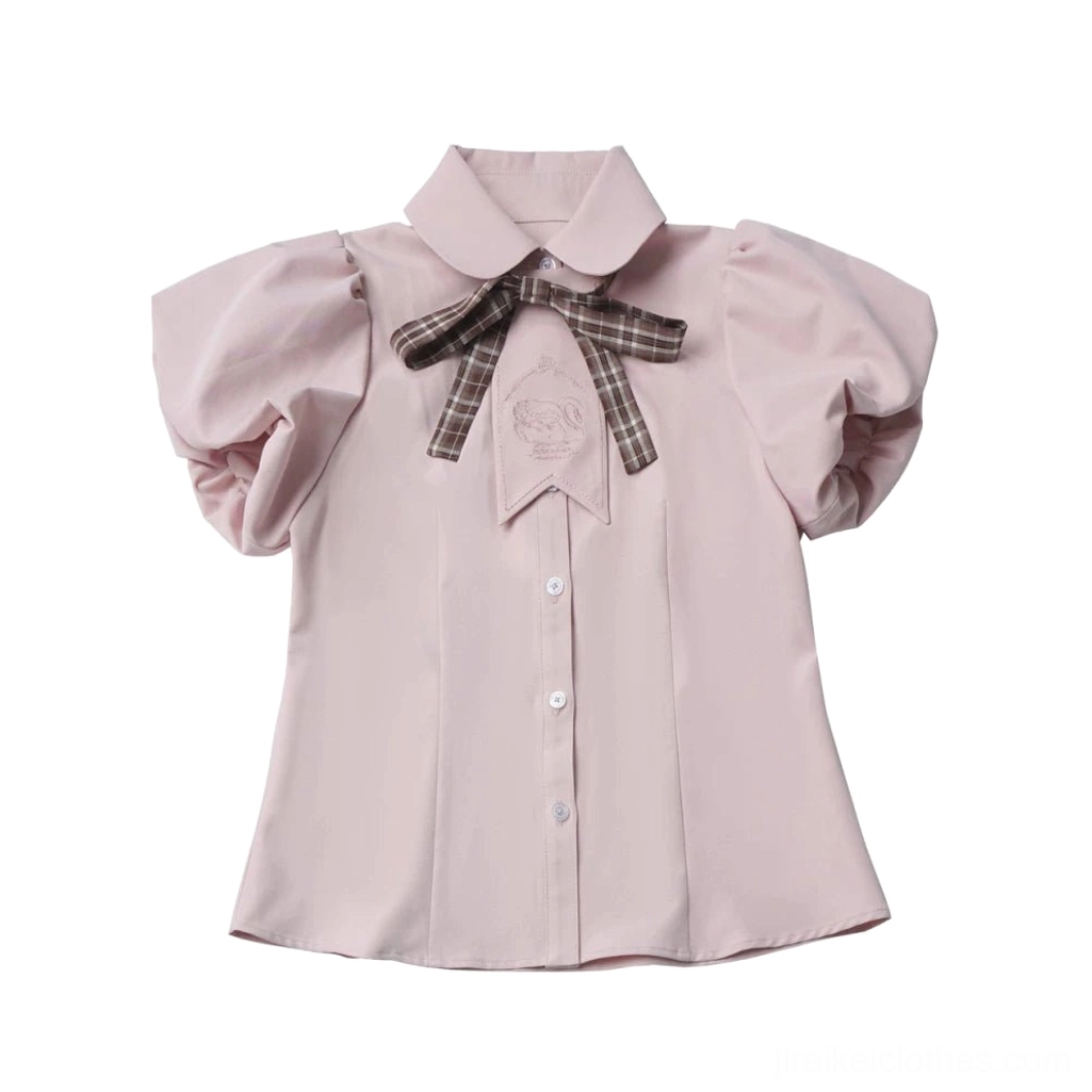 Pink bubble sleeve puff blouse flat lay featuring detachable plaid bow tie Peter Pan collar front button closure embroidered swan collar panel