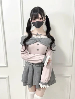 Pink-gray plaid long-sleeve Jirai Kei off-shoulder top with heart buttons and ruffled cuffs, complete outfit styling view