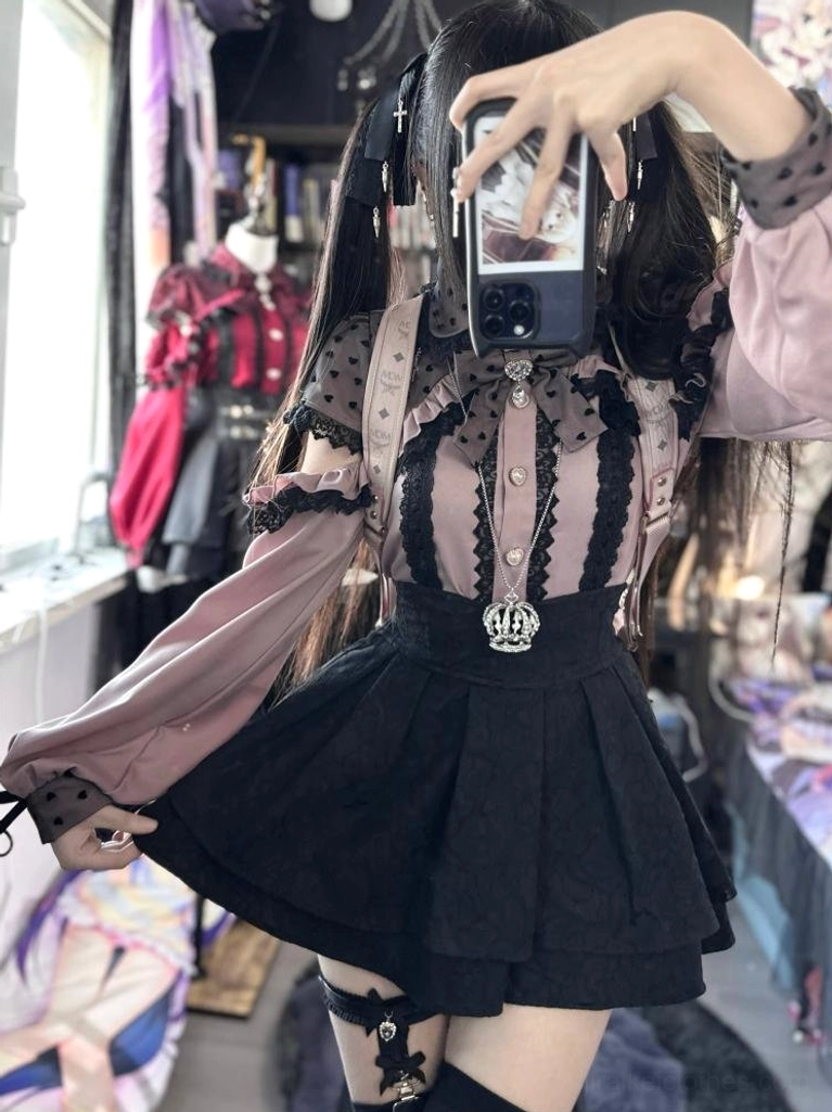 Pink jirai kei off-shoulder blouse with heart polka dots and black lace trim worn as part of complete subculture aesthetic outfit