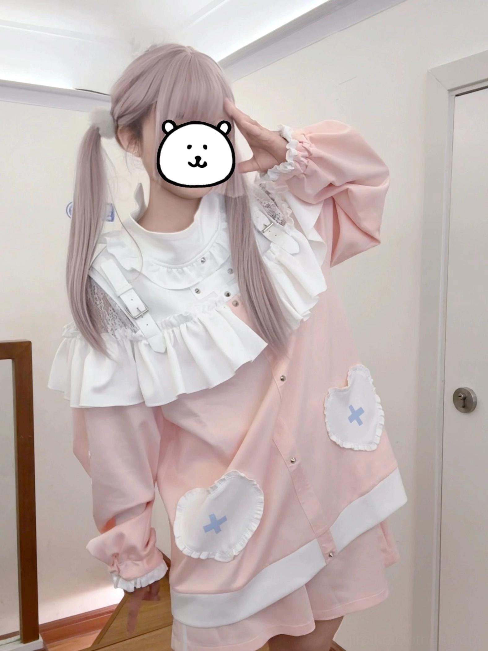 Pink Jirai Kei lolita two-piece set half-body front shot with heart-cross patches and ruffled collar, modeling therapeutic subculture fashion
