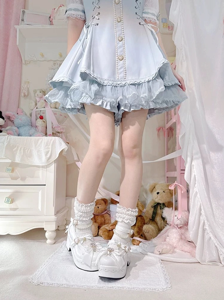 Pink Jirai Kei platform Lolita shoes pearl embellishments bow details thick platform heel side view