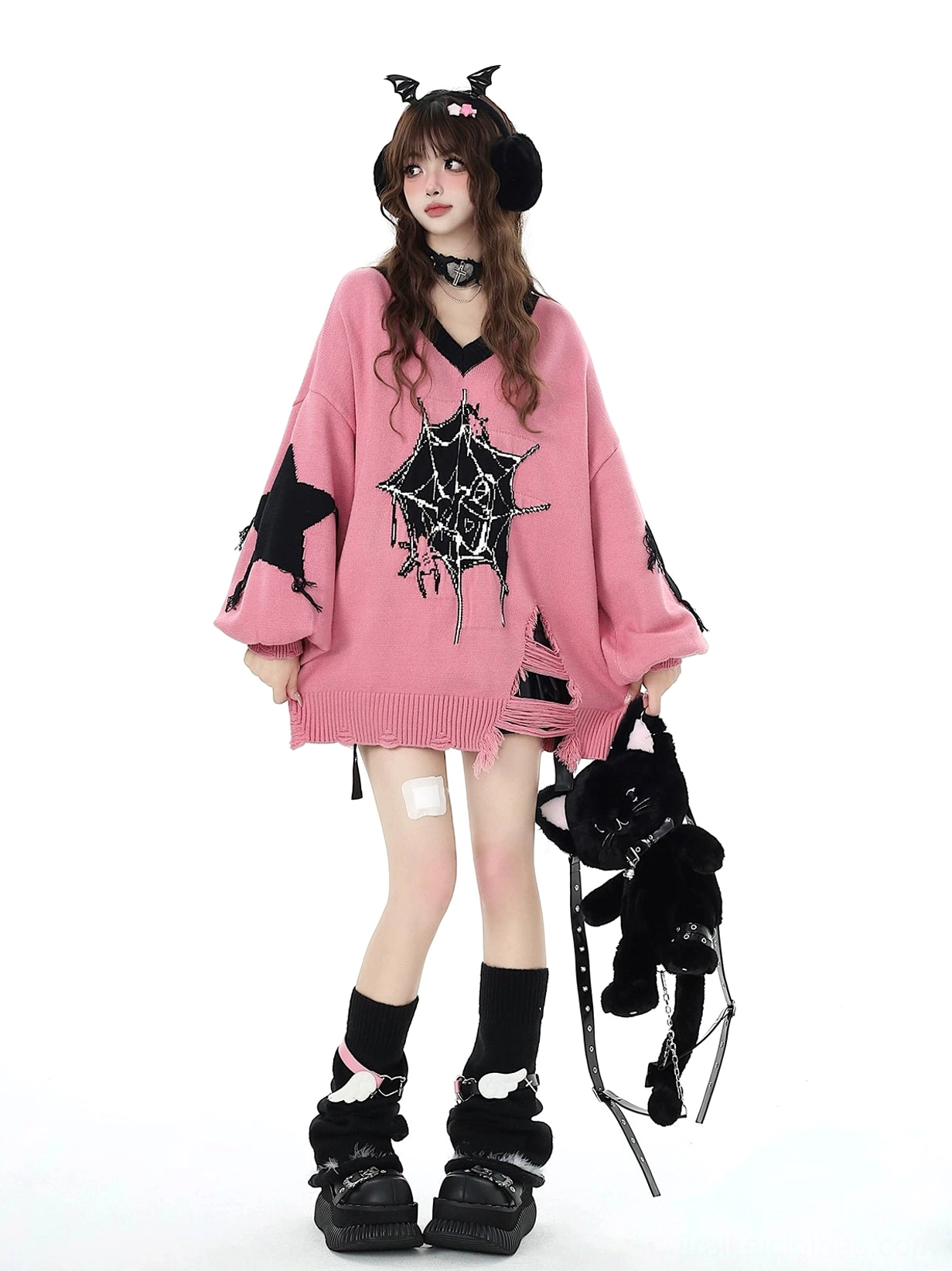 Pink Jirai Kei V-neck knit sweater layered styling guide with mesh top and statement jewelry accessories