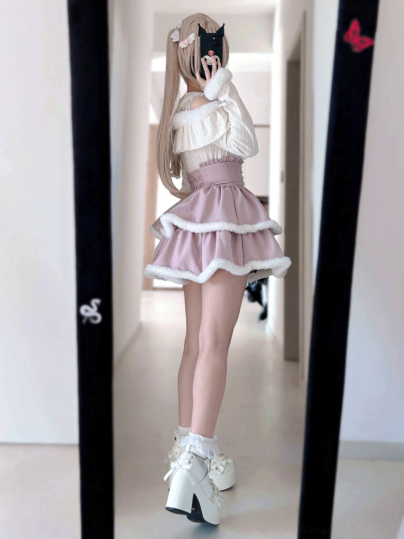 Back view mirror shot pink tiered Jirai Kei skirt high waist silhouette plush trim ruffled hem