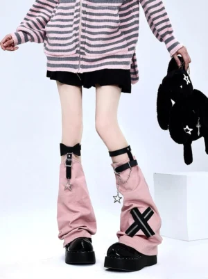 Pink Jirai Kei Y2K leg warmer with cross-chain buckle and star charm details, front lower body view worn with striped hoodie and black mini skirt