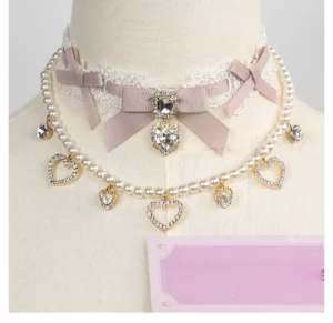 Pink lace bow jirai kei choker with white lace trim heart rhinestone pendant front view