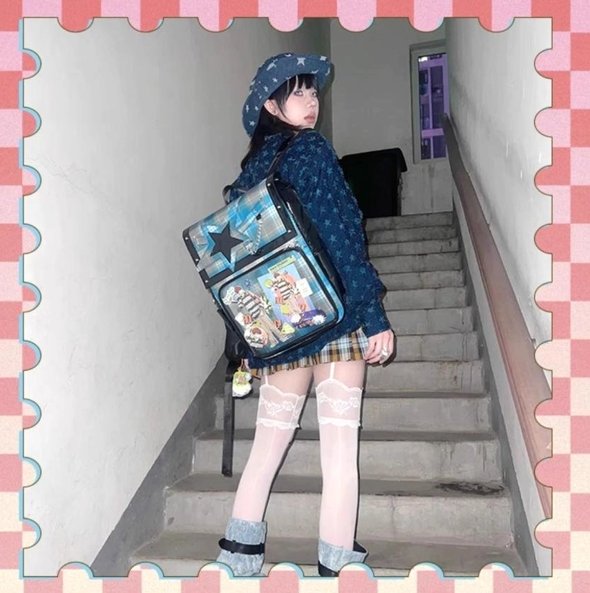 Pink-purple tartan star ita backpack casual styling with plush accessories and transparent badge display