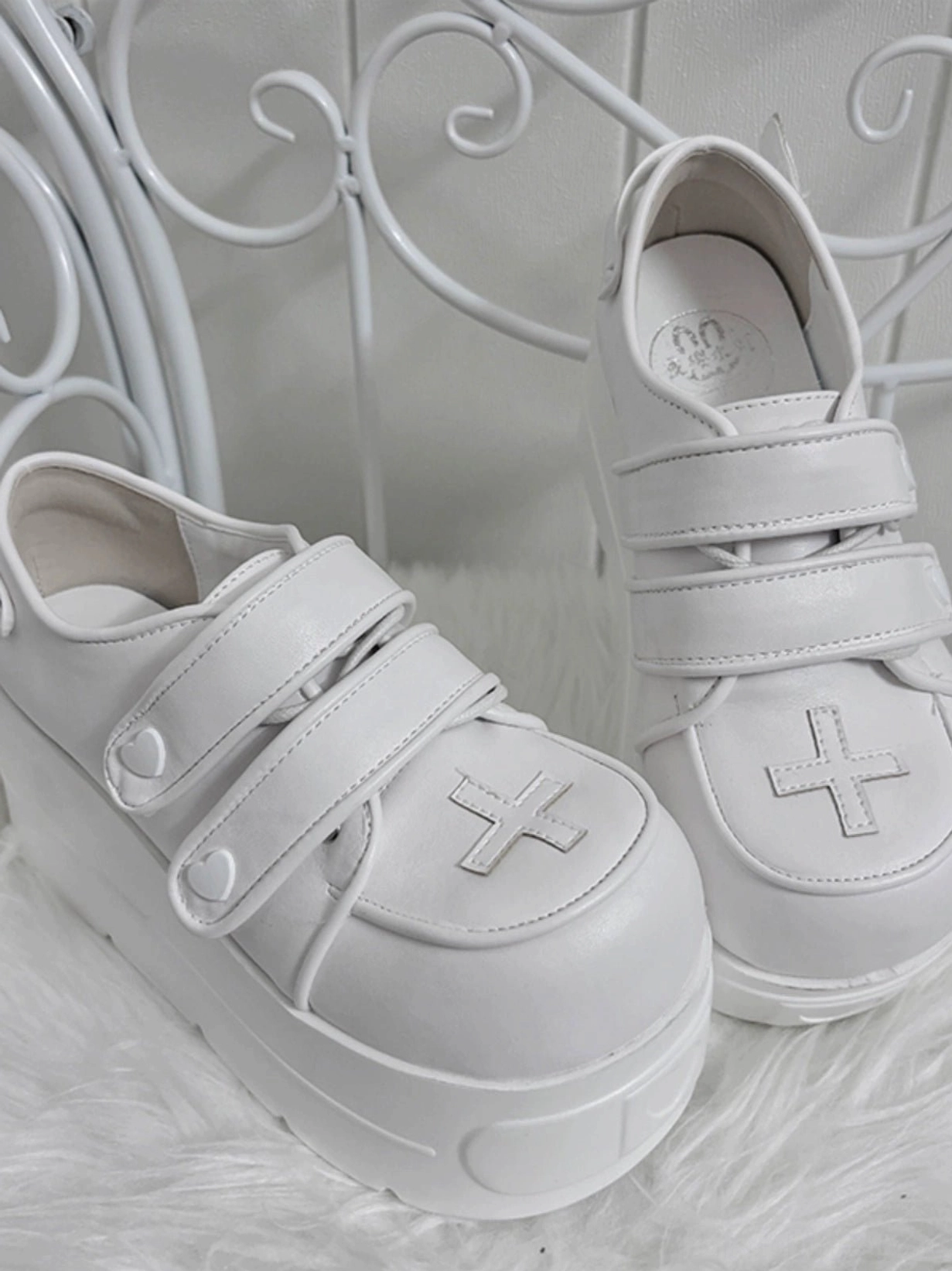Pink white angel heart platform shoes side view furry white bed cross accents hook and loop fasteners chunky platform sole