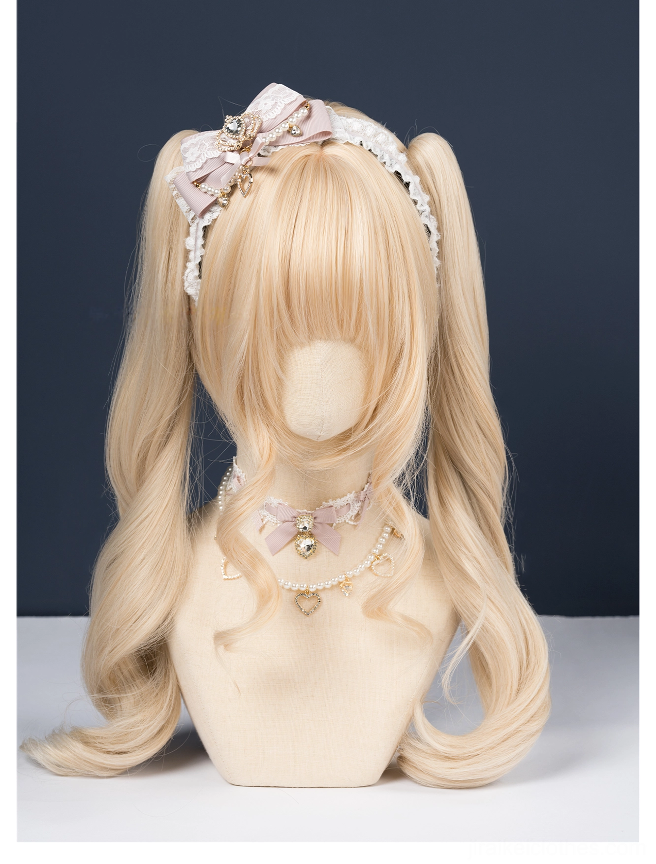Pink and white ryousangata lace bow headband front mannequin view dark studio backdrop matching bow choker jirai kei complete set