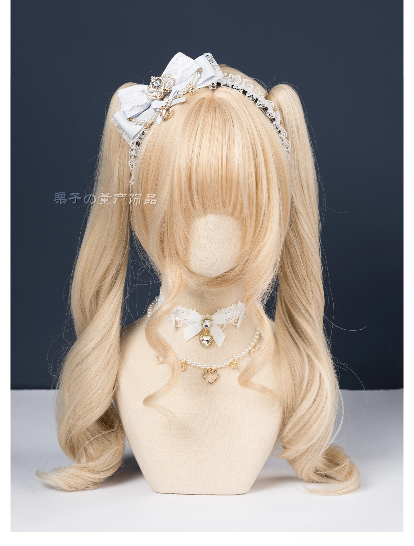 Pink and white ryousangata plush bow headband mannequin front view soft material romantic aesthetic dark backdrop