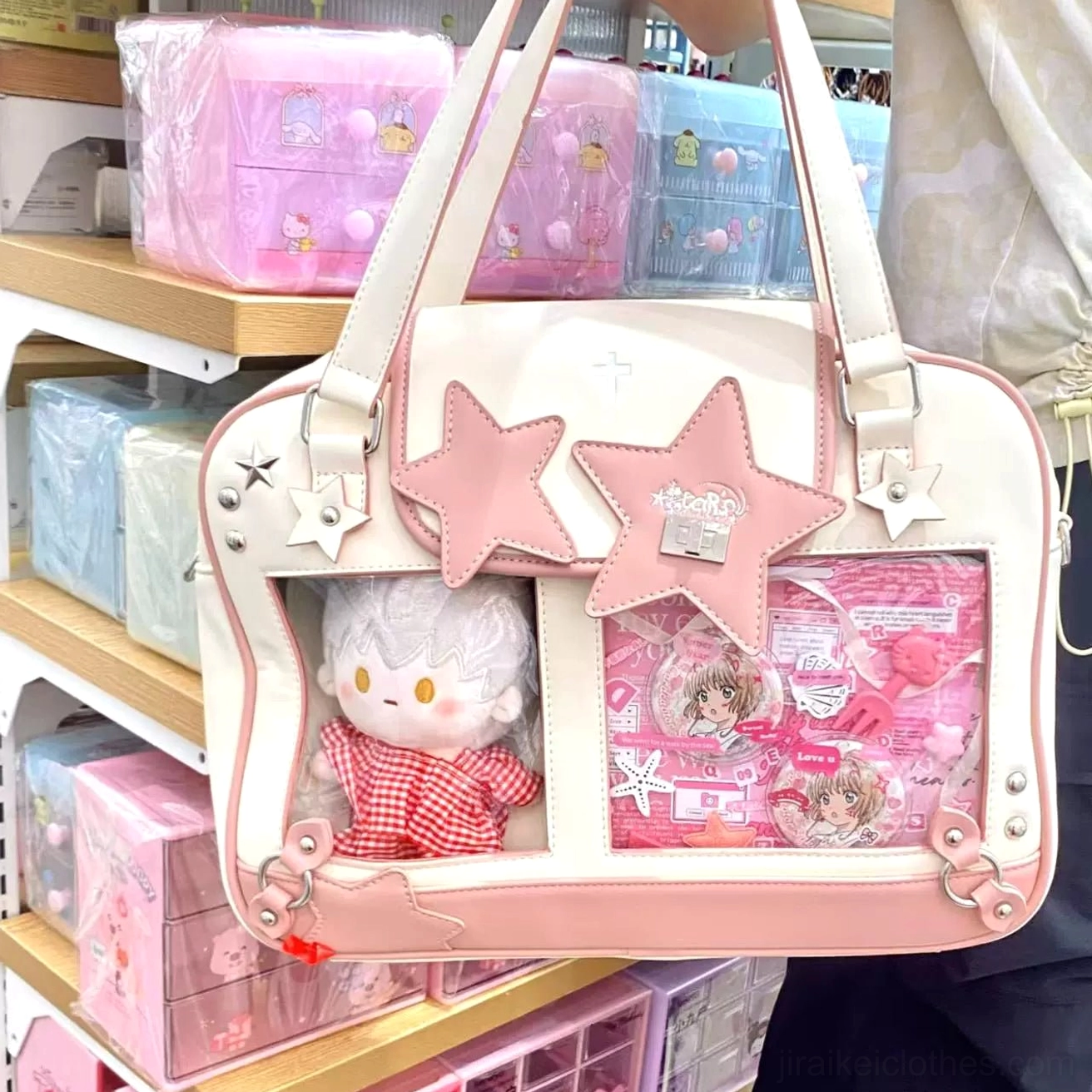 Pink white star-themed Jirai Kei itabag three-quarter view convenience store shelf display