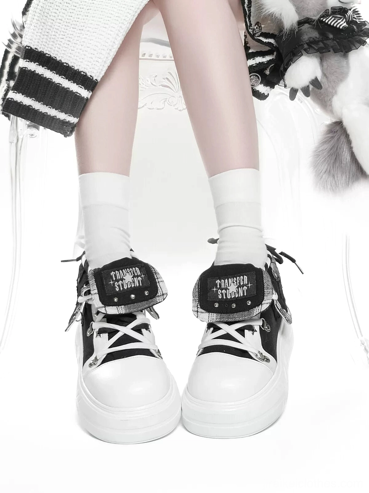 Alternative angle of platform canvas sneaker showing foldable collar mechanism and canvas upper texture with contrasting dual lacing design detail