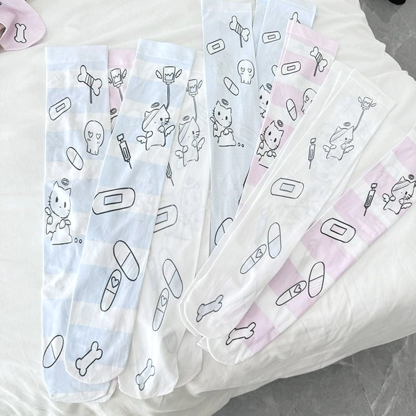 Pure white angel Tenshi Kaiwai over-the-knee velvet socks with cute cartoon angel and cherub designs, lace cuff detail, product variant closeup