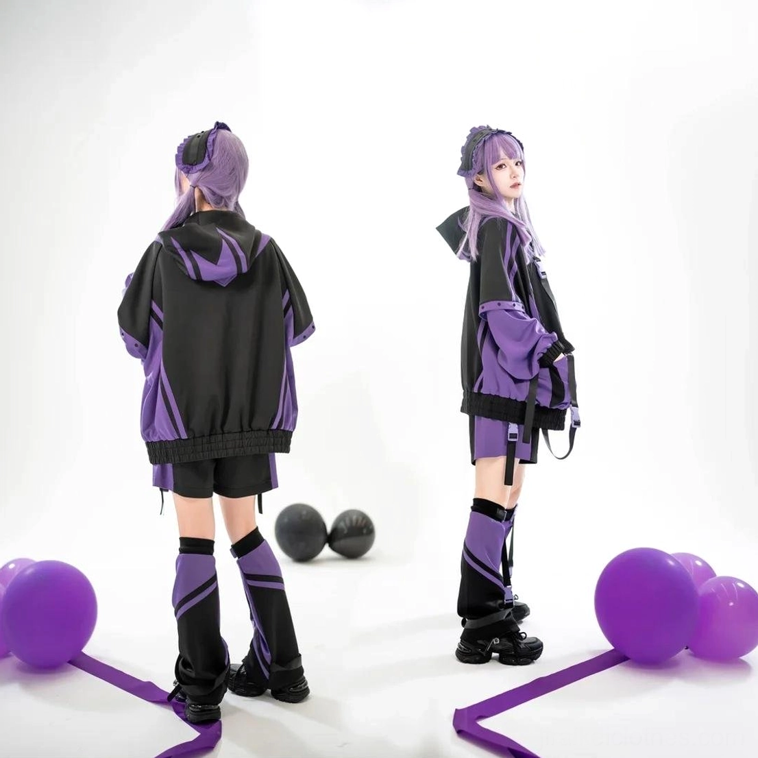 Matching purple-black hooded color-block sporty jacket sets on double models back and side view with leg covers