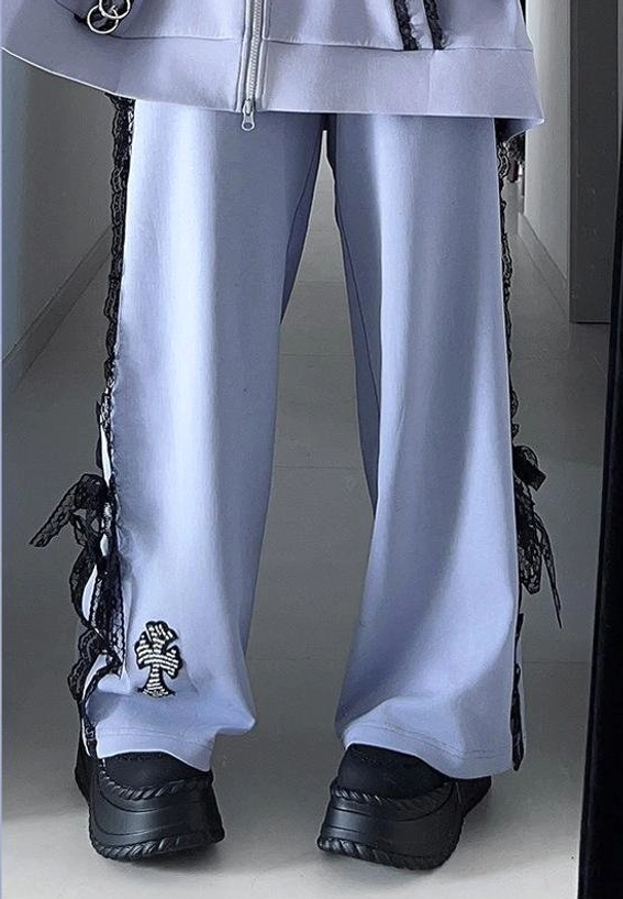 Purple Jirai Kei wide-leg pants with elastic waist and ruffled details, perfect complement to oversized hoodie for complete Jirai Kei outfit coordination