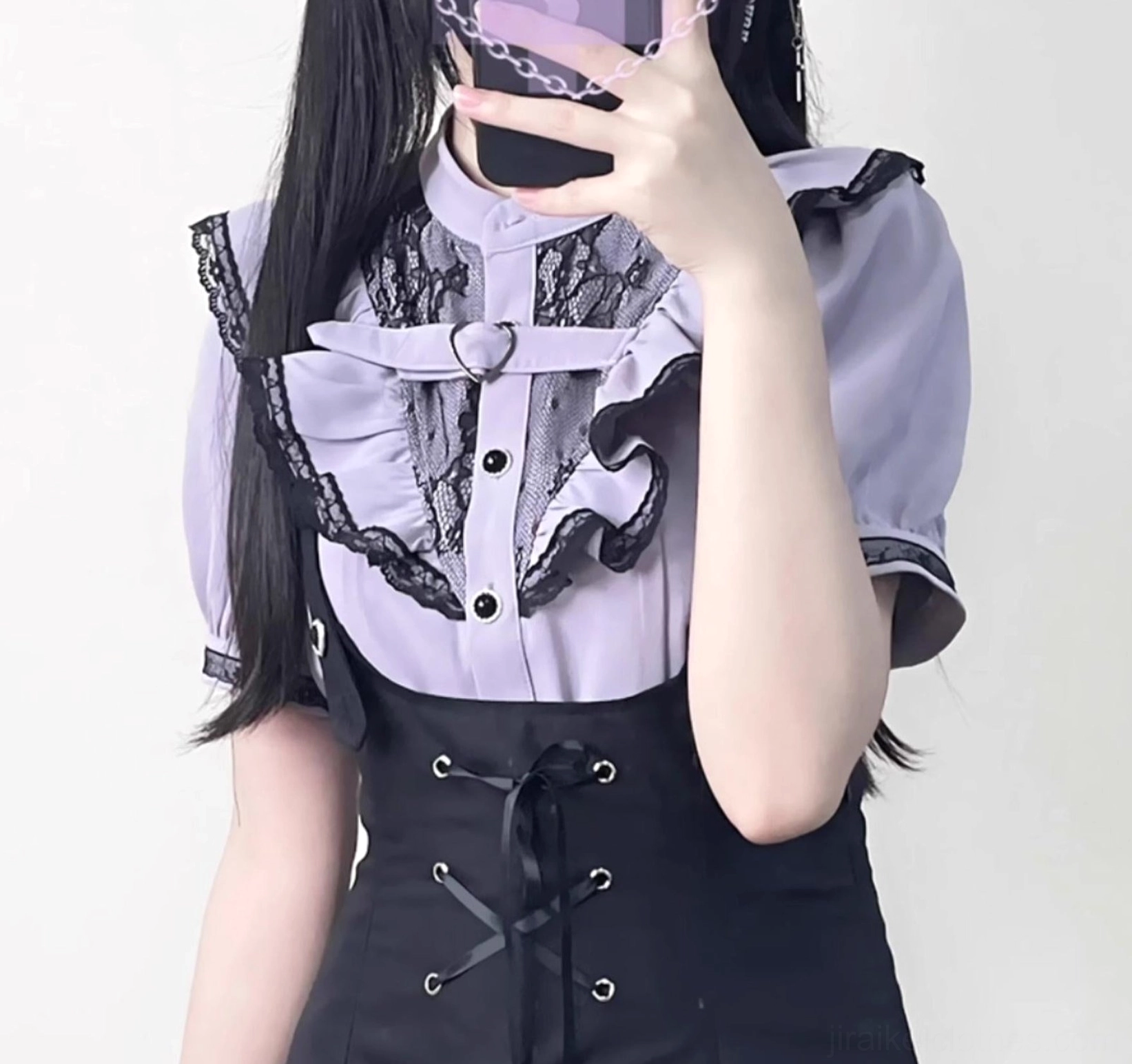 Purple short-sleeved jirai kei blouse with heart buckle front buttons and black lace-trimmed ruffle