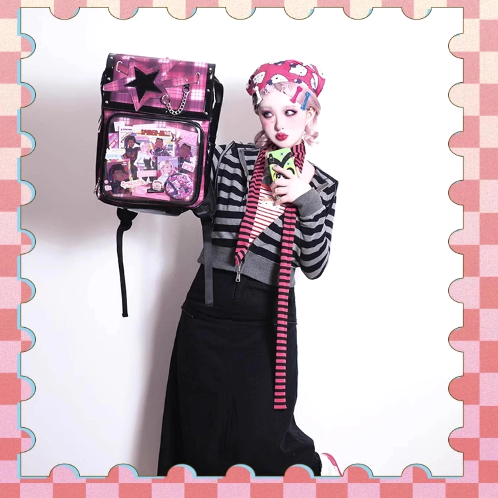 Red tartan star ita backpack detail of magnetic flap system and display window seal integrity