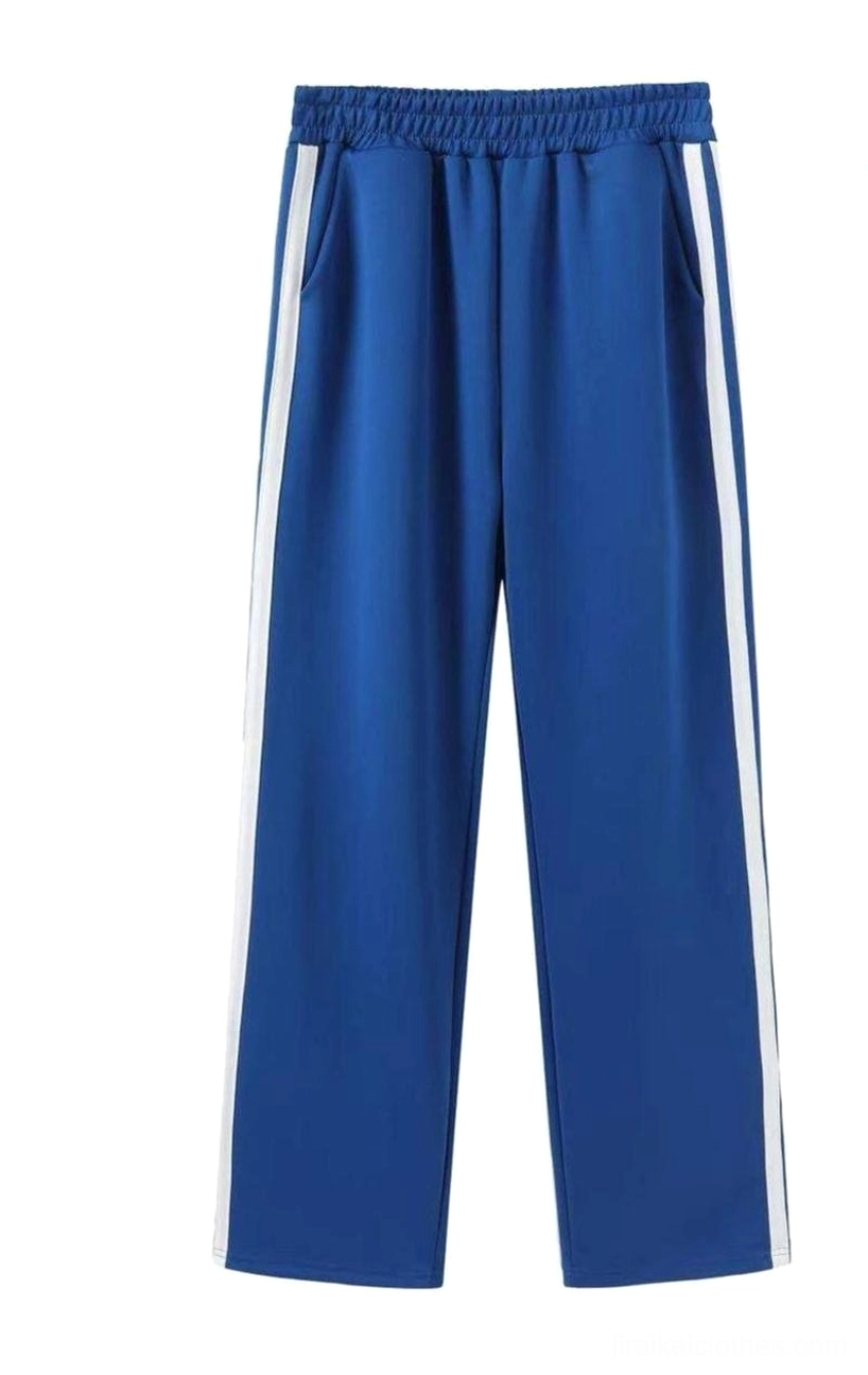Elastic-waisted royal blue track pants straight leg white side stripes flat lay front view