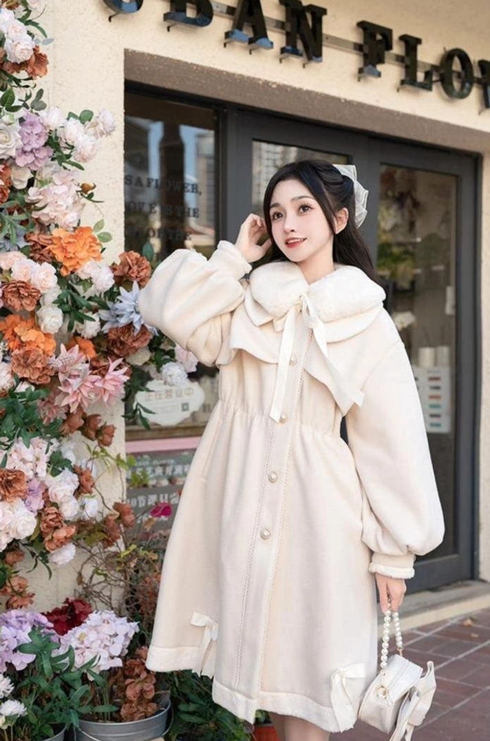 Ryousangata Jirai Kei winter coat pocket detail - functional side pockets and gathered waist construction showing practical design and romantic silhouette