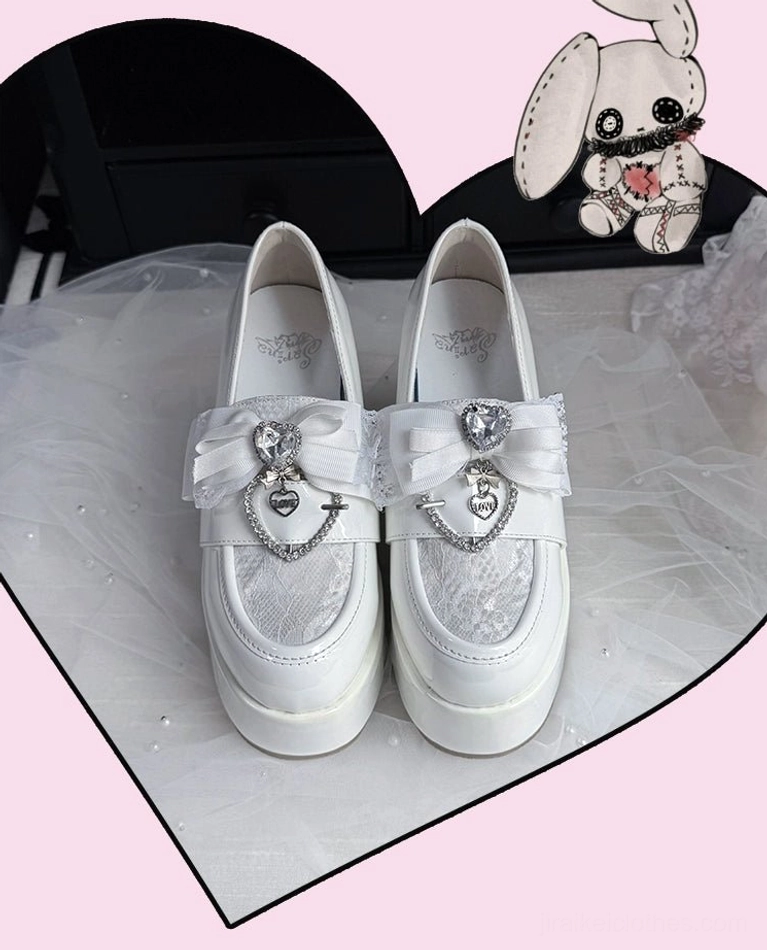 Ryousangata platform loafers handmade craftsmanship detail showing meticulous lace overlay stitching and bow embellishment construction
