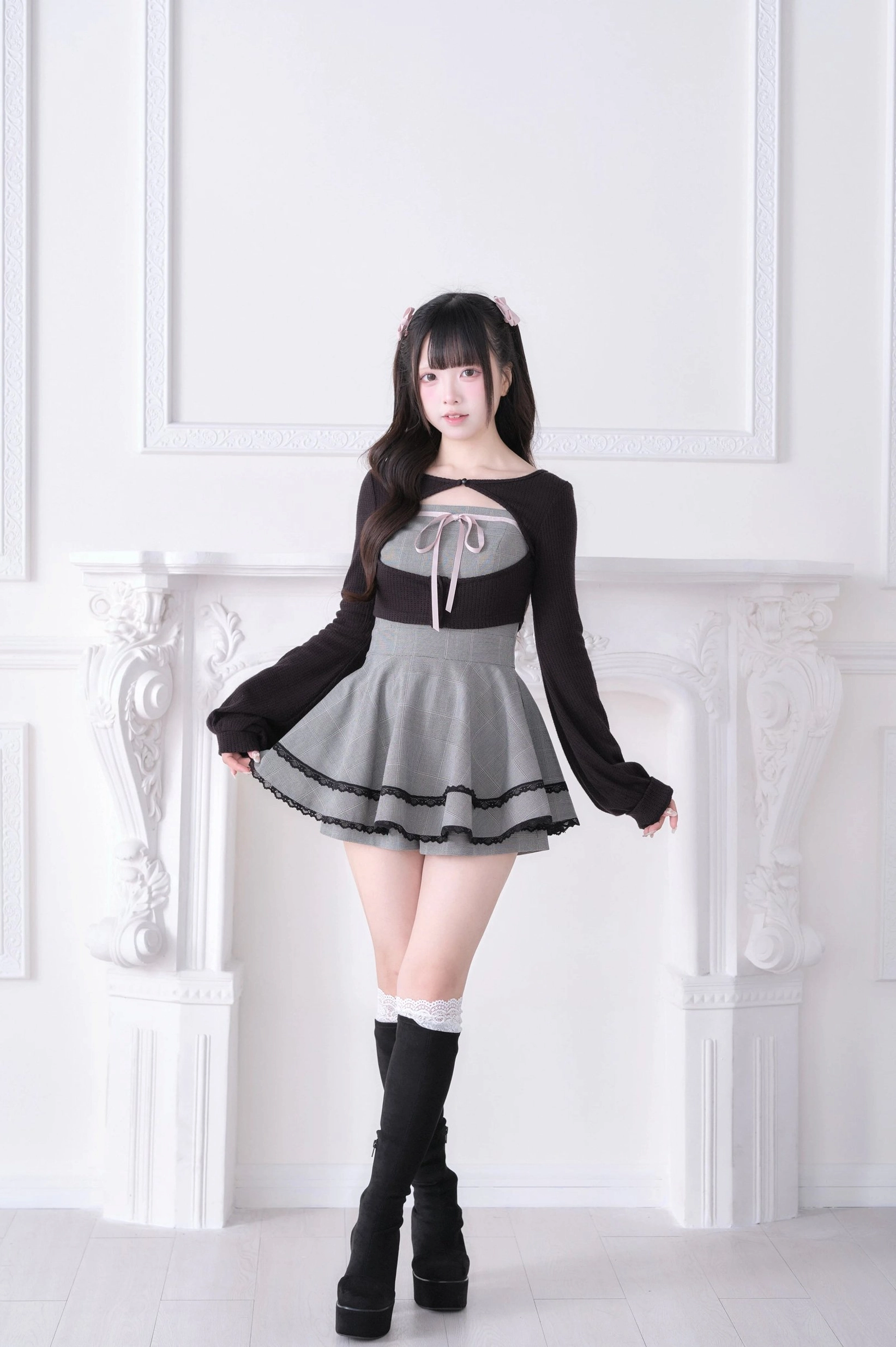 Sweet lolita Jirai Kei outfit side view - brown bolero, black knee-high boots, grey plaid ruffled mini skirt
